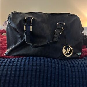 Michael Kors Black Satchel with Gold Hardware